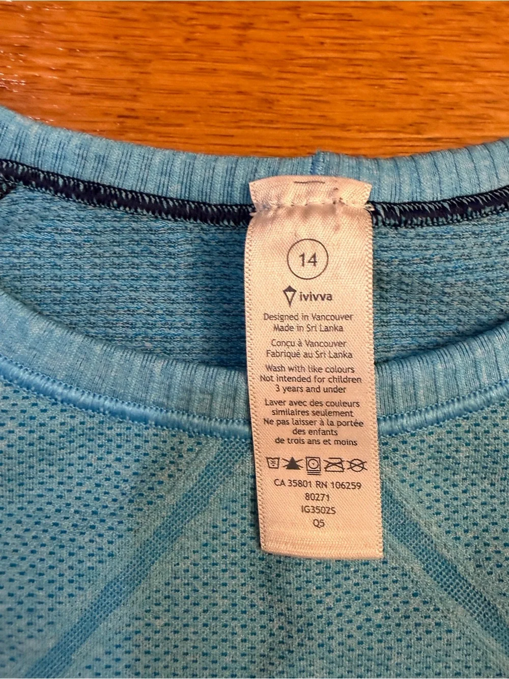 Ivivva (Lululemon) Girl’s Fly Tech Long Sleeve Tee in Blue w/ stripes - Size 14
